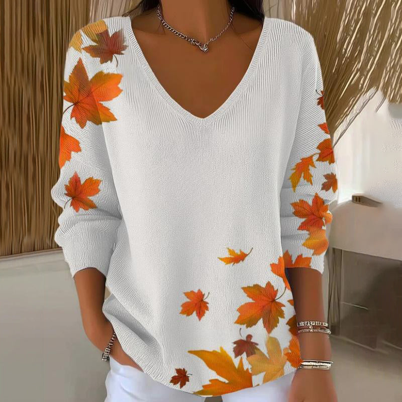 Knitted sweater with long sleeves